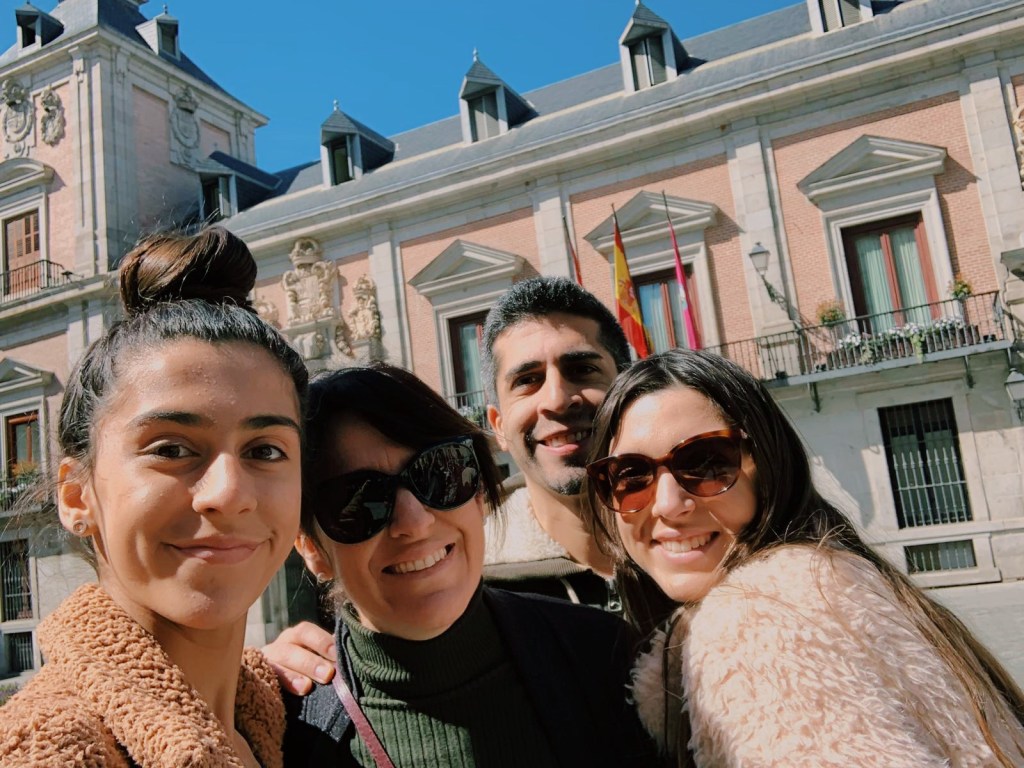 My family and I outside of the Royal Palace of Madrid